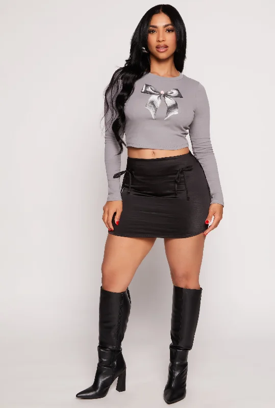 Almost Famous Bow Graphic Long Sleeve Crop Top